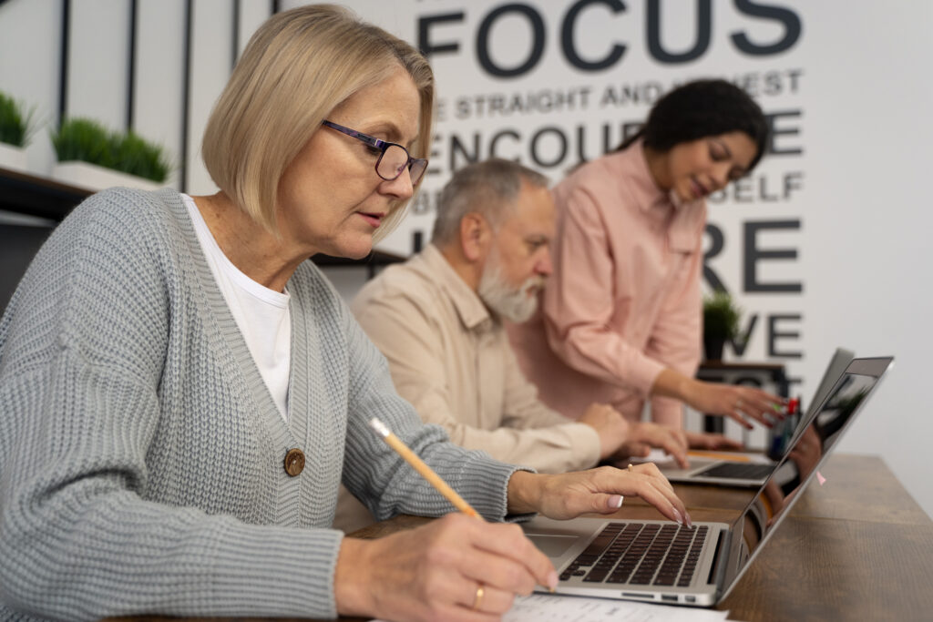 senior-people-school-class-with-laptop-computer